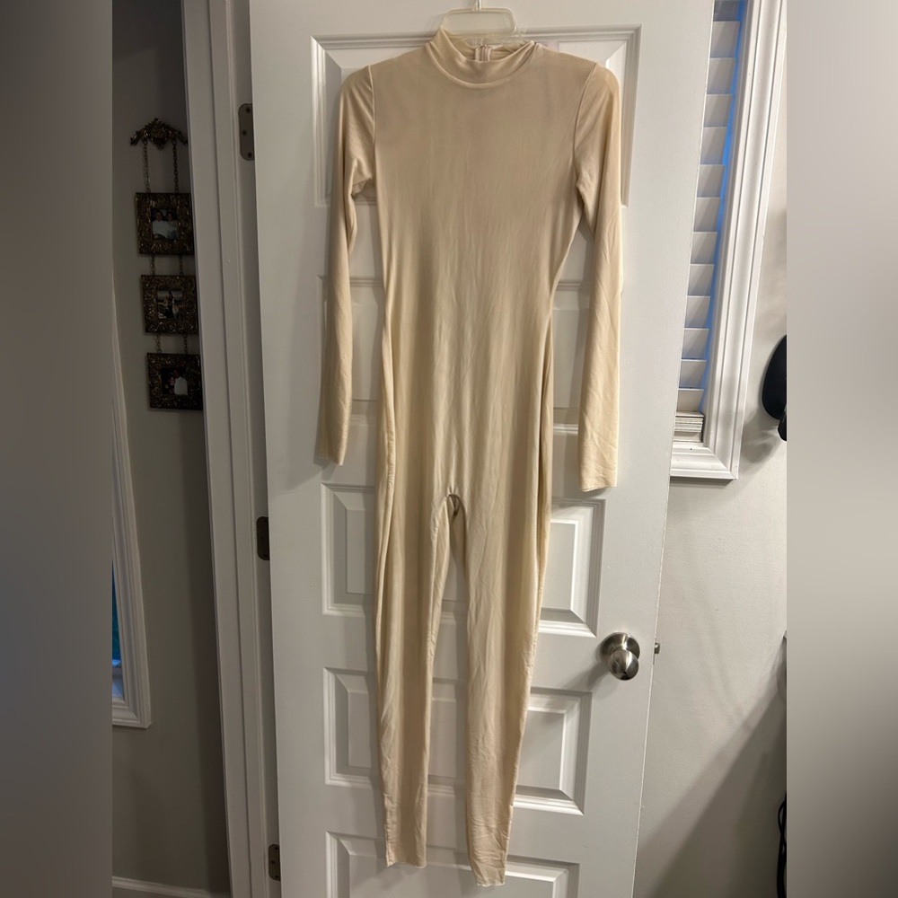 Naked Wardrobe Mesh Jumpsuit